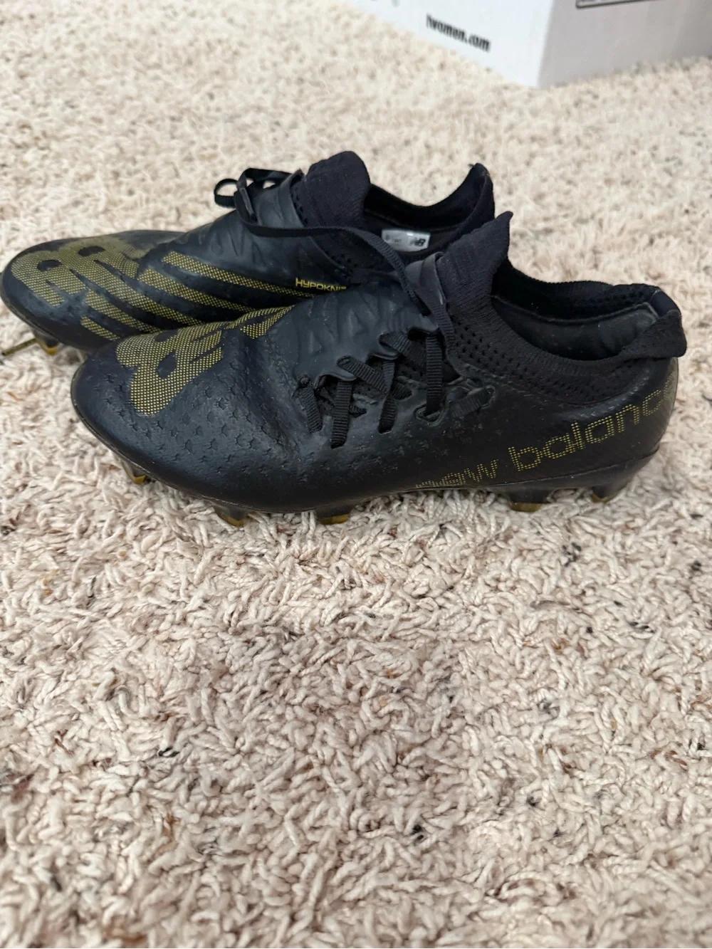 New Balance Men's Black Athletic Shoes with Gold Logo